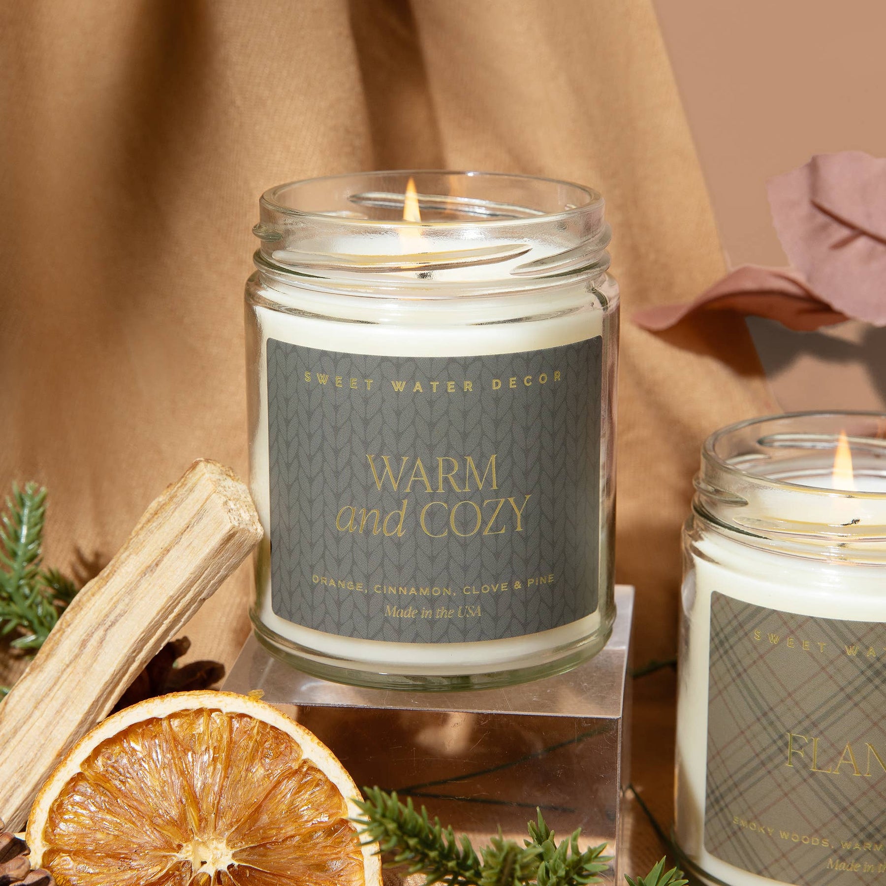 Sweet Water Decor - *NEW* Warm and Cozy 9 oz Soy Candle - Home Decor & Gifts