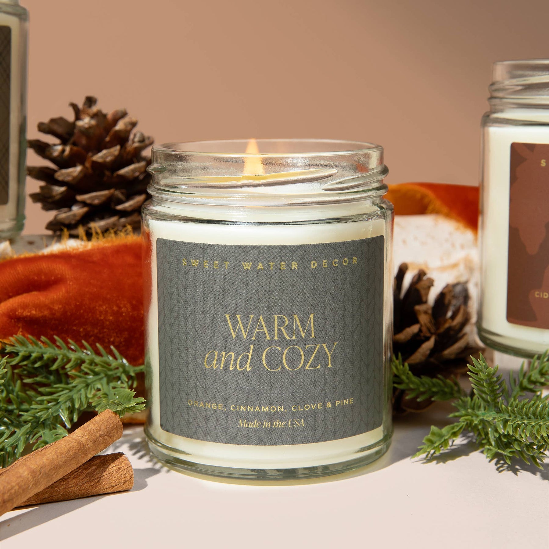 Sweet Water Decor - *NEW* Warm and Cozy 9 oz Soy Candle - Home Decor & Gifts